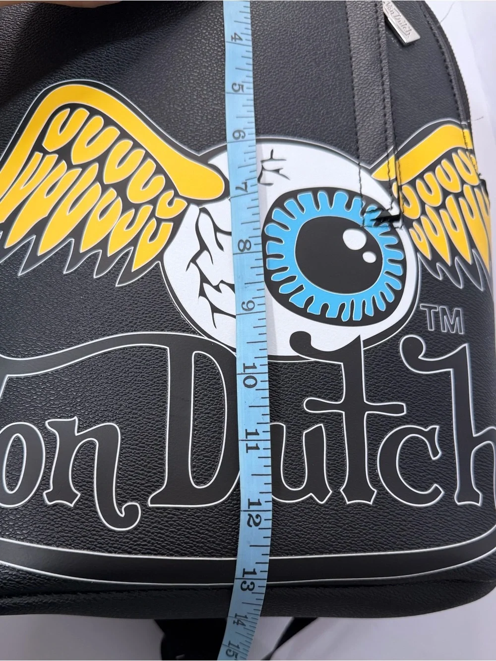 Von Dutch Black Backpack with Yellow Winged Eyeball and Blue Iris